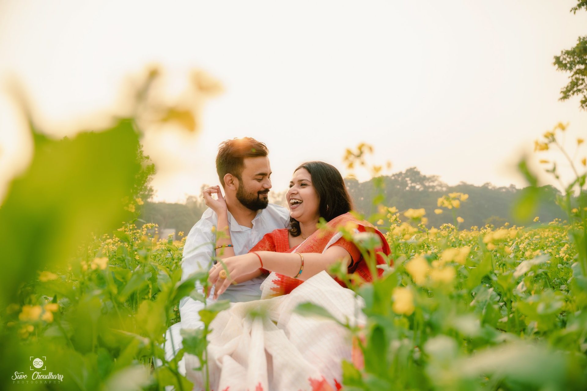 Wedding photographer in Siliguri – pre-wedding golden hour mustard field – Suvo Choudhury