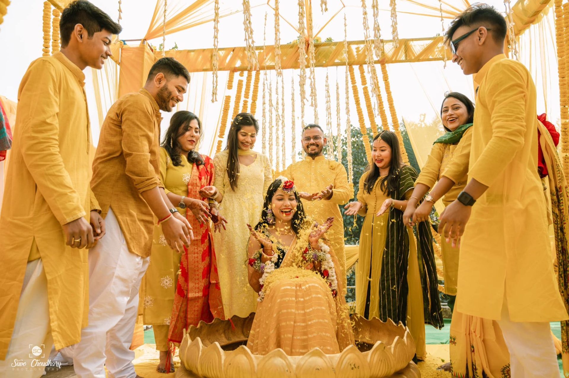 Wedding photographer in Siliguri – Gaye Holud bride with friends – Suvo Choudhury