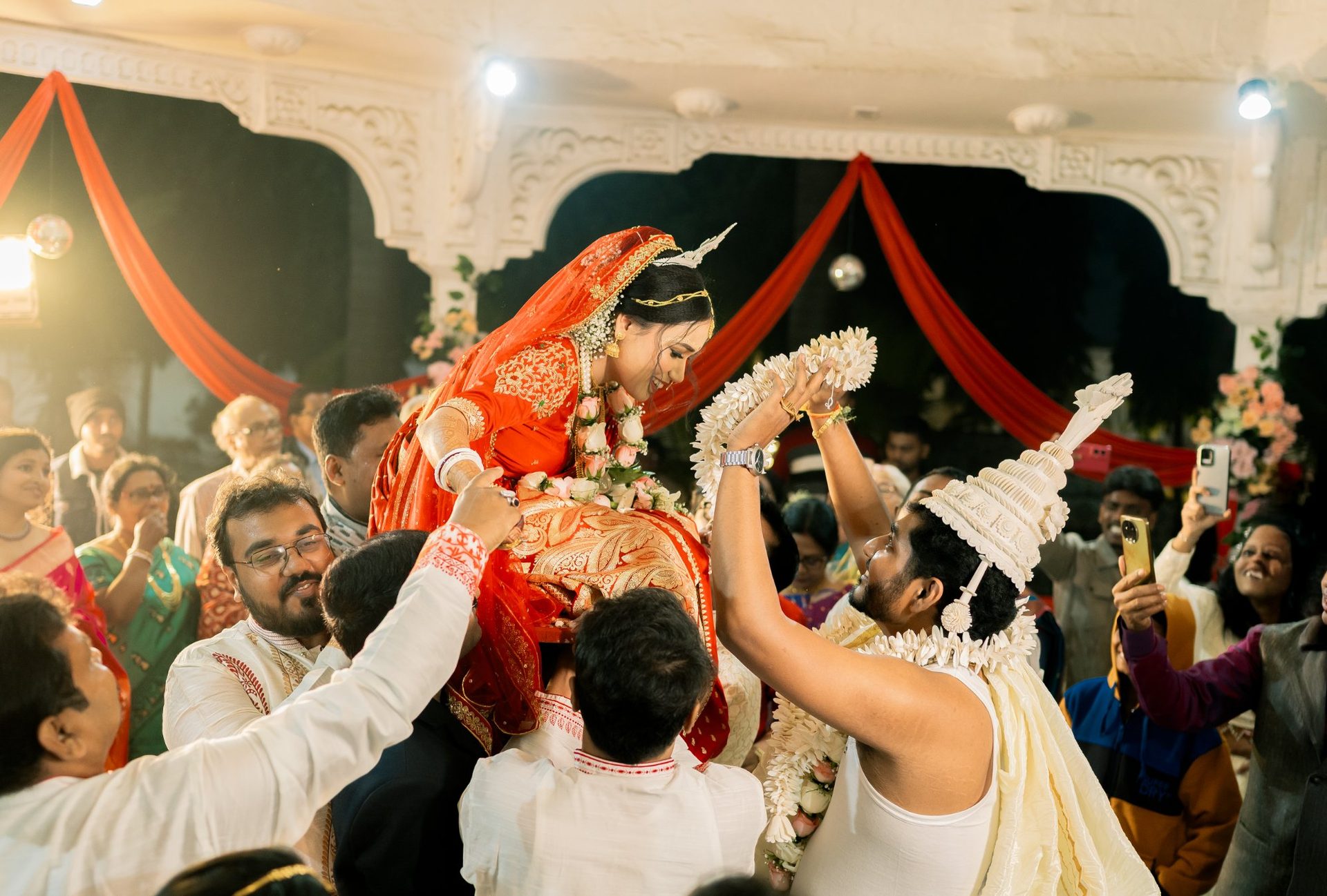 Wedding photographer in Siliguri – Mala Badal garland exchange – Suvo Choudhury